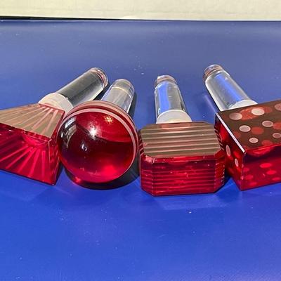 Vintage 4-Piece Mikasa Red Glass Wine Bottle Stoppers Slightly Used Condition as Pictured.