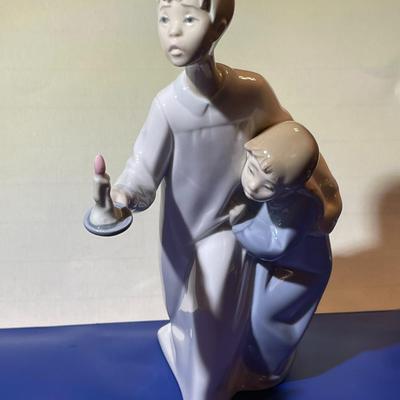 Vintage Lladro “Boy in Night Shirt Holding Candle” Figurine #4874 in VG Preowned Condition.