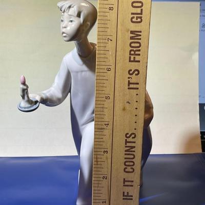 Vintage Lladro “Boy in Night Shirt Holding Candle” Figurine #4874 in VG Preowned Condition.