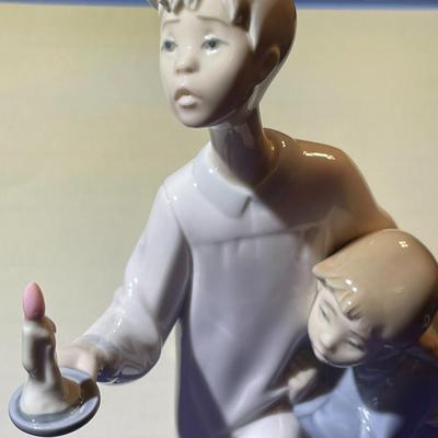 Vintage Lladro “Boy in Night Shirt Holding Candle” Figurine #4874 in VG Preowned Condition.