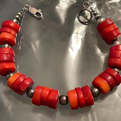 Vintage Mid-Century Sterling Silver Coral Disc Bracelet 7.5" Long in Good Preowned Condition.