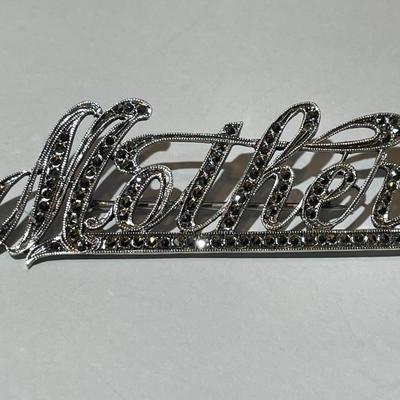 Vintage Sterling Silver .925 Marcasite "Mother" Pin in VG Preowned Condition.
