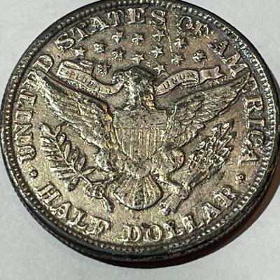 1912-P OLD TIME "COUNTERFEIT" VF CONDITION BARBER HEAD HALF DOLLAR AS PICTURED.