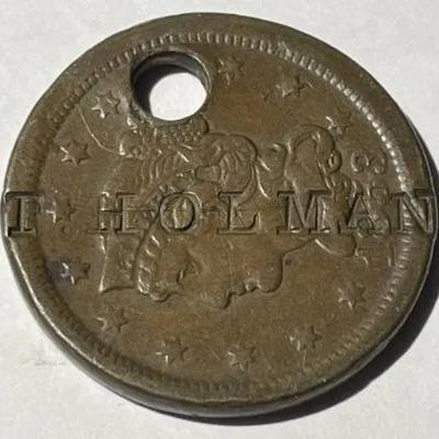 1853 (T. HOLMAN) COUNTERSTAMPED & HOLED LARGE CENT FOR PENDANT AS PICTURED.