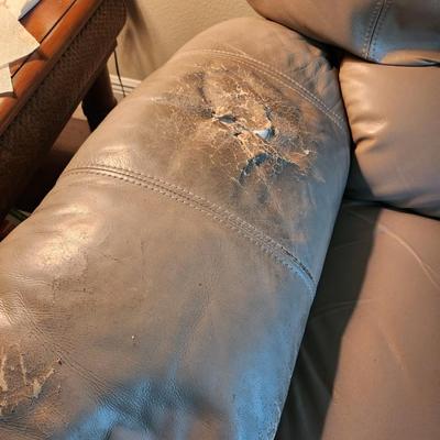 Two leather oversized recliners
