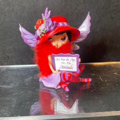 Lot 123. Red Hat Figurine