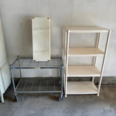 2 TIER METAL CART ON CASTERS AND 2 SMALLER PLASTIC SHELVES