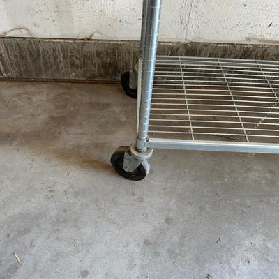 2 TIER METAL CART ON CASTERS AND 2 SMALLER PLASTIC SHELVES