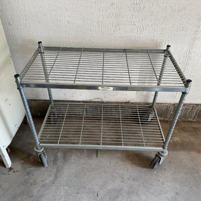 2 TIER METAL CART ON CASTERS AND 2 SMALLER PLASTIC SHELVES