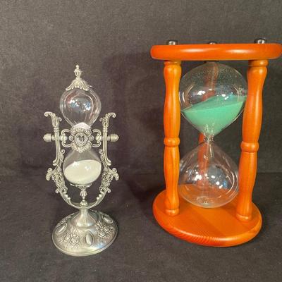 Lot 134 Two Fancy Hourglasses
