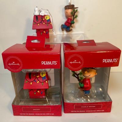 Lot 151. Four Peanuts Character Ornaments