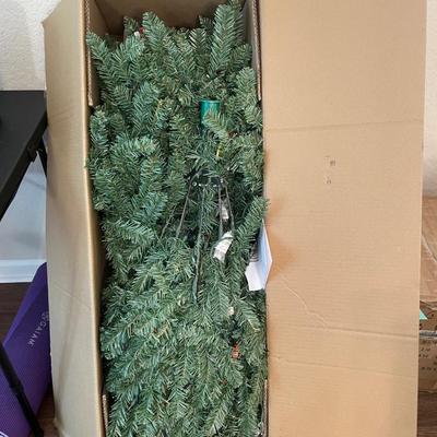 Lot 179. Artificial 6 ft Pre-lit Christmas Tree - New