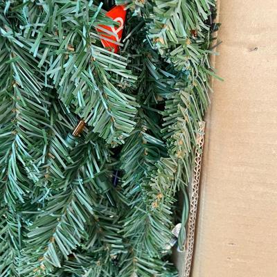 Lot 179. Artificial 6 ft Pre-lit Christmas Tree - New