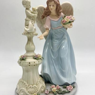 Porcelain Angel With Cherub Statue