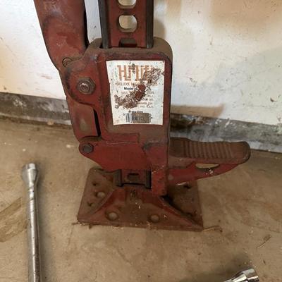 HI-LIFT JACK AND A 4 WAY LUG NUT WRENCH