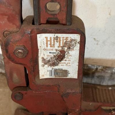 HI-LIFT JACK AND A 4 WAY LUG NUT WRENCH