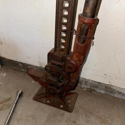 HI-LIFT JACK AND A 4 WAY LUG NUT WRENCH
