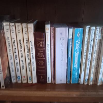 SMALL BOOKCASE FILLED WITH NOVELS