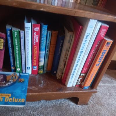 SMALL BOOKCASE FILLED WITH NOVELS