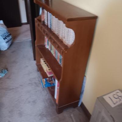 SMALL BOOKCASE FILLED WITH NOVELS