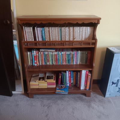 SMALL BOOKCASE FILLED WITH NOVELS