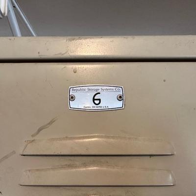 A SECTION OF 3 SCHOOL LOCKERS SLIGHTLY MODIFIED