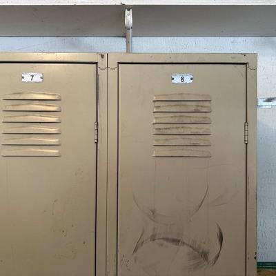 A SECTION OF 3 SCHOOL LOCKERS SLIGHTLY MODIFIED