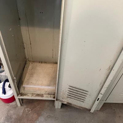 A SECTION OF 3 SCHOOL LOCKERS SLIGHTLY MODIFIED