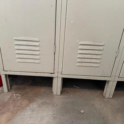 A SECTION OF 3 SCHOOL LOCKERS SLIGHTLY MODIFIED