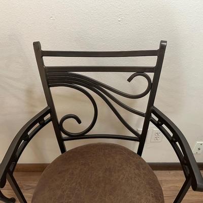 2 IRON SWIVEL BAR STOOLS WITH RAWHIDE CUSHIONED SEATS