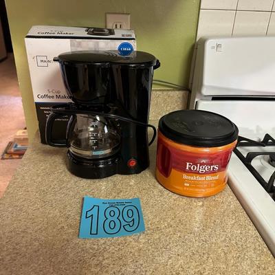 NEW COFFEE MAKER AND SEALED FOLGERS COFFEE