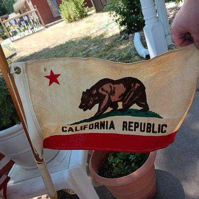 A VARIETY OF US FLAGS AND POLES