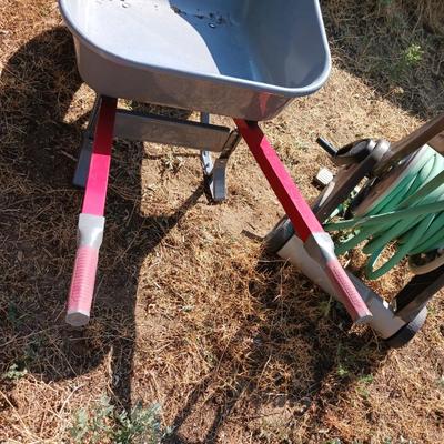 ACE HARDWARE WHEELBARROW AND A GARDEN HOSE REEL