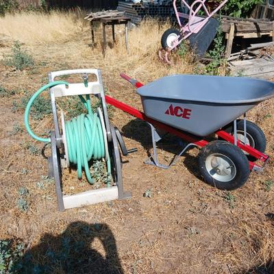 ACE HARDWARE WHEELBARROW AND A GARDEN HOSE REEL