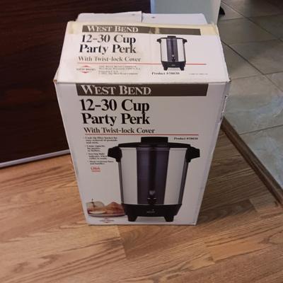 FOLDING 6 FOOT TABLE AND A 12 - 30 CUP PARTY PERK