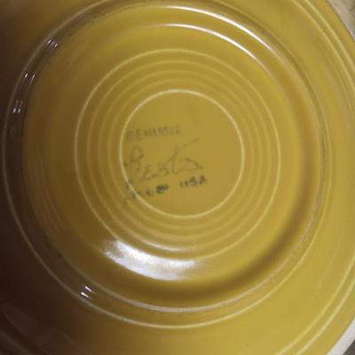 AN ASSORTMENT OF FIESTAWARE DISHES