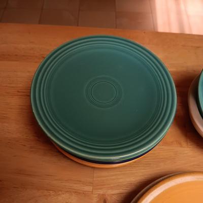 AN ASSORTMENT OF FIESTAWARE DISHES
