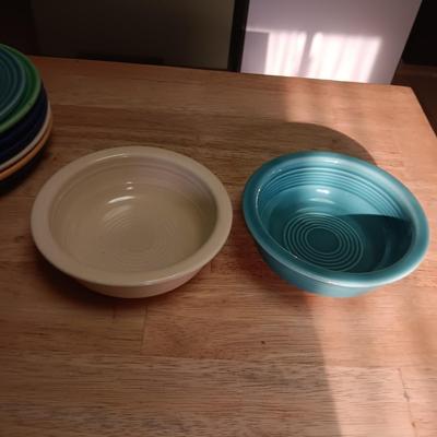 AN ASSORTMENT OF FIESTAWARE DISHES