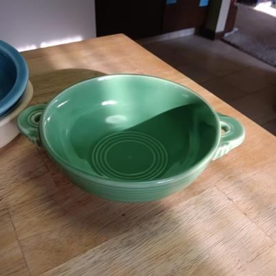 AN ASSORTMENT OF FIESTAWARE DISHES