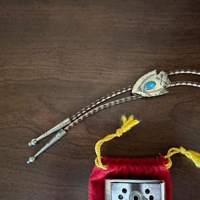 COMPASSES, BOLO TIE, BELT BUCKLE, HAND WARMER AND MORE
