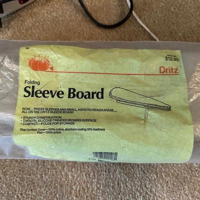 IRONING AND SLEEVE BOARD PLUS A CLOTHES IRON