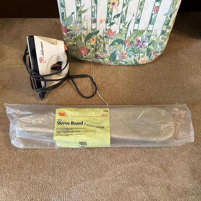 IRONING AND SLEEVE BOARD PLUS A CLOTHES IRON