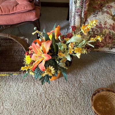 WICKER BASKETS AND FAUX FLOWERS IN A VASE