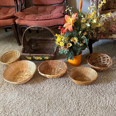 WICKER BASKETS AND FAUX FLOWERS IN A VASE