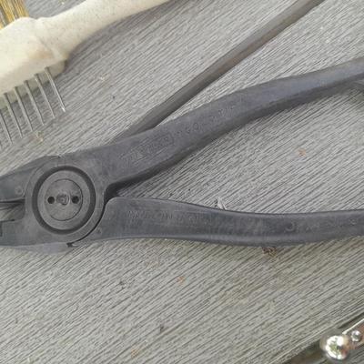Upholstery pliers with an assortment of other hand tools and small screwdrivers from Germany