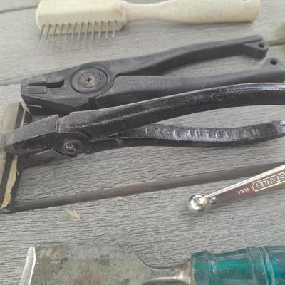 Upholstery pliers with an assortment of other hand tools and small screwdrivers from Germany