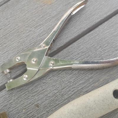 Upholstery pliers with an assortment of other hand tools and small screwdrivers from Germany
