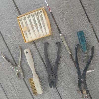 Upholstery pliers with an assortment of other hand tools and small screwdrivers from Germany