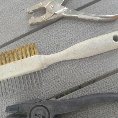 Upholstery pliers with an assortment of other hand tools and small screwdrivers from Germany