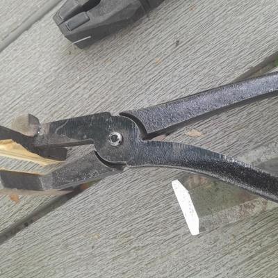 Upholstery pliers with an assortment of other hand tools and small screwdrivers from Germany